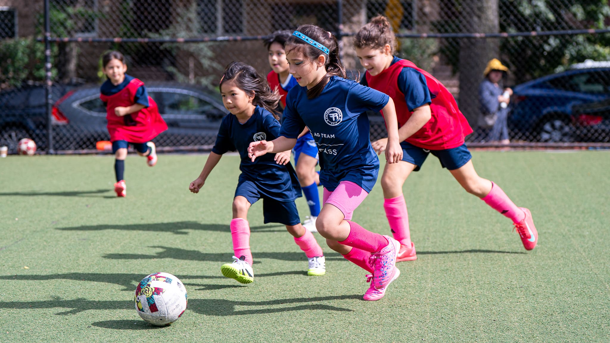 Girls playing soccer at Futbol Rebels Clubhouse